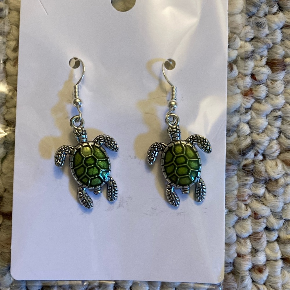 “ Sea Turtle” earrings.